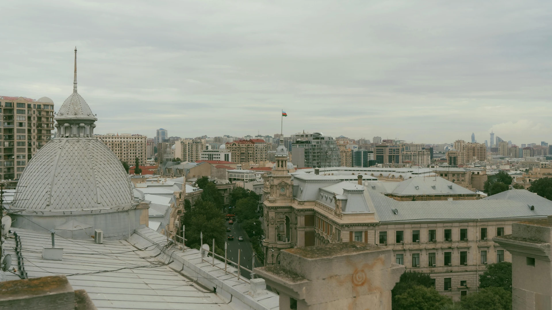 Alexandria, Egypt - Elevated view of baku showcasing historic and modern architecture under cloudy skies.