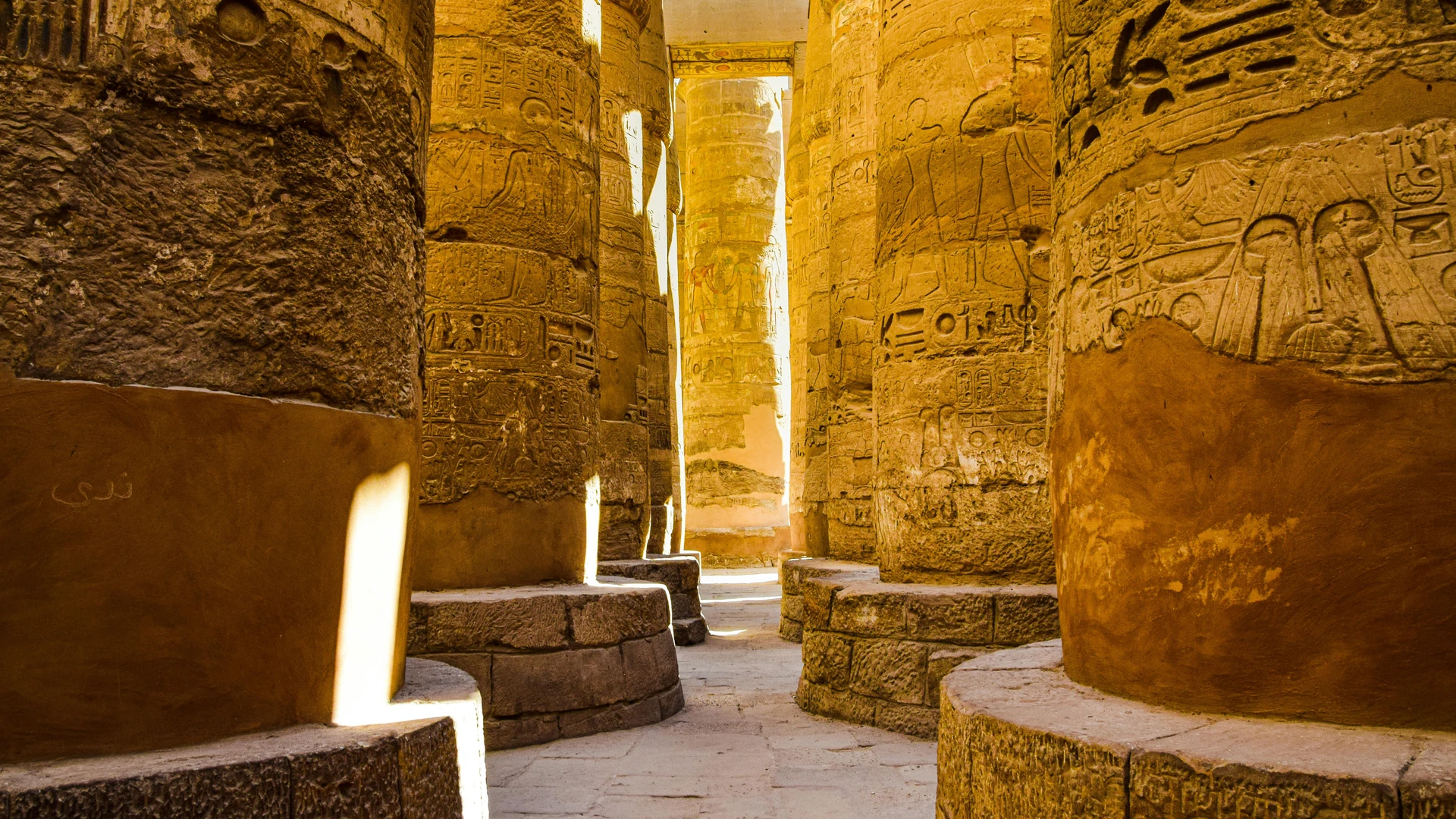 Marsa Alam, Egypt - Sunlit ancient columns in the historic karnak temple complex in luxor, egypt.