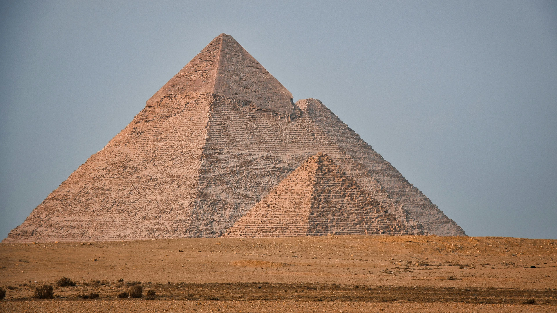 Sahl Hasheesh, Egypt - Iconic great pyramid of giza standing tall in the egyptian desert under a clear blue sky.
