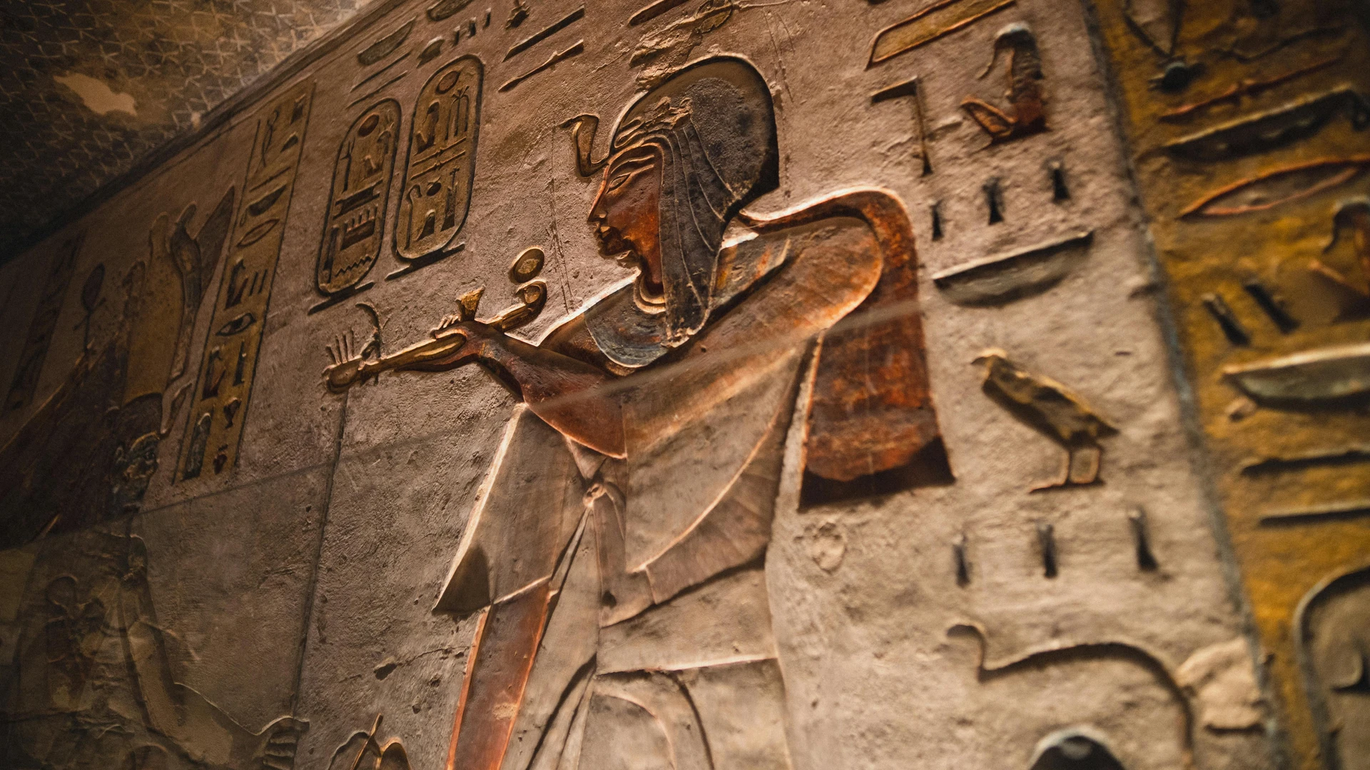 Sahl Hasheesh, Egypt - Detailed view of an ancient egyptian wall carving with hieroglyphics, showcasing historical art.