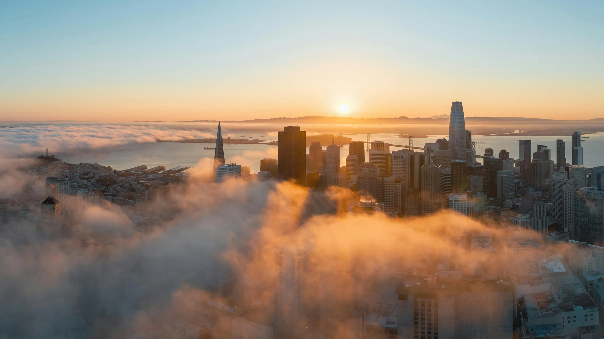Soma Bay, Egypt - Breathtaking aerial view of san francisco skyline at sunrise with fog enveloping the cityscape.