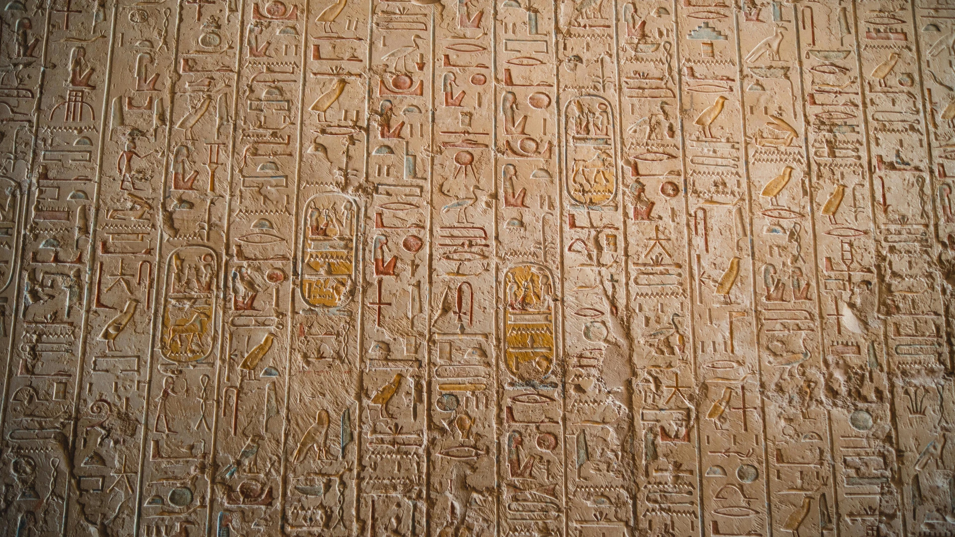 Soma Bay, Egypt - Close-up of ancient egyptian hieroglyphs carved on temple walls, showcasing historical art.
