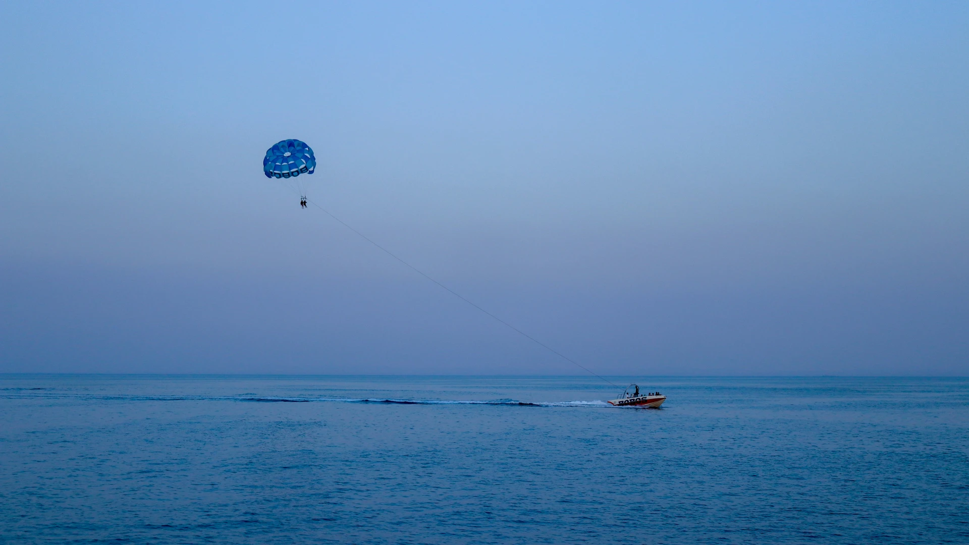 Ain Sokhna, Egypt - Blue and white balloon floating on blue sea during daytime