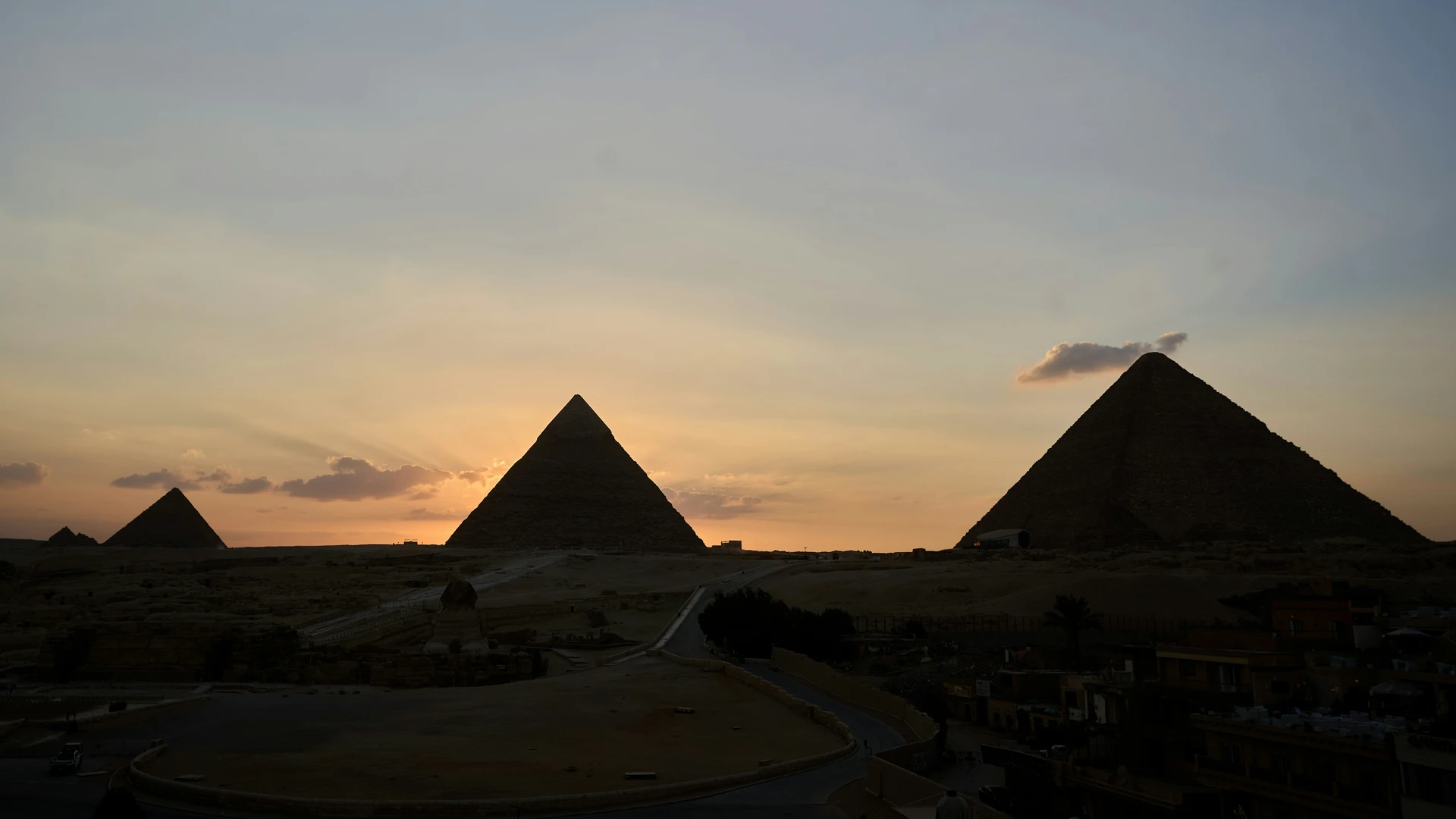 Ain Sokhna, Egypt - Sun is setting over the pyramids of giza