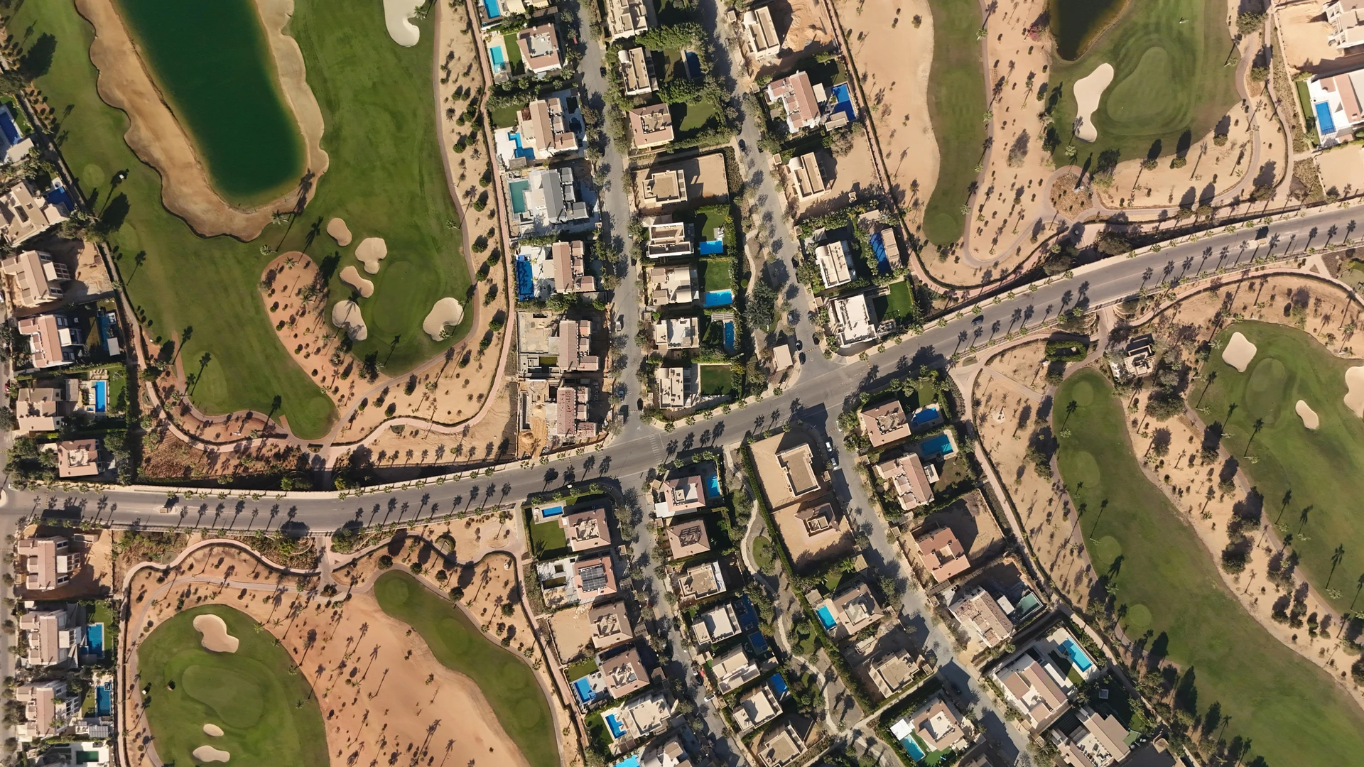 Cairo, Egypt - Discover the luxury homes and green golf courses in sheikh zayed, egypt, captured from above.