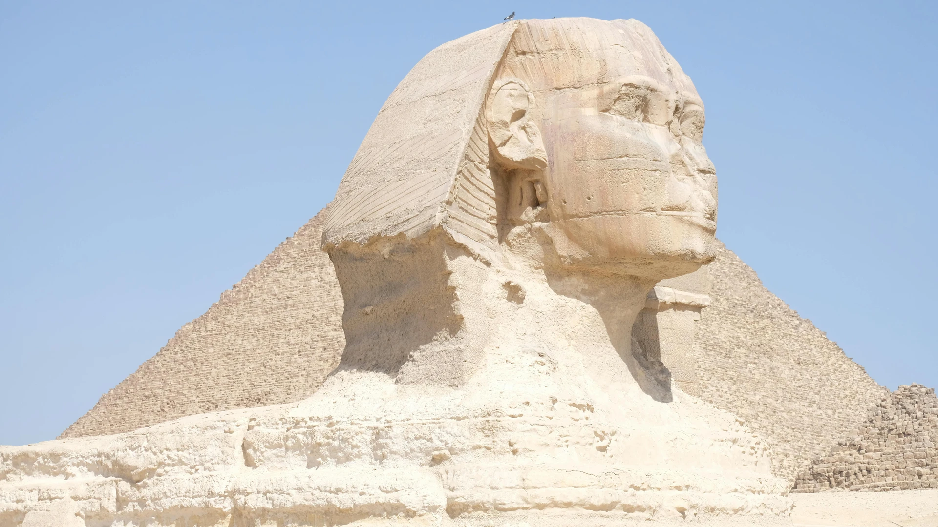 Giza, Egypt - Great sphinx of giza with its majestic and iconic presence set against a clear blue sky.