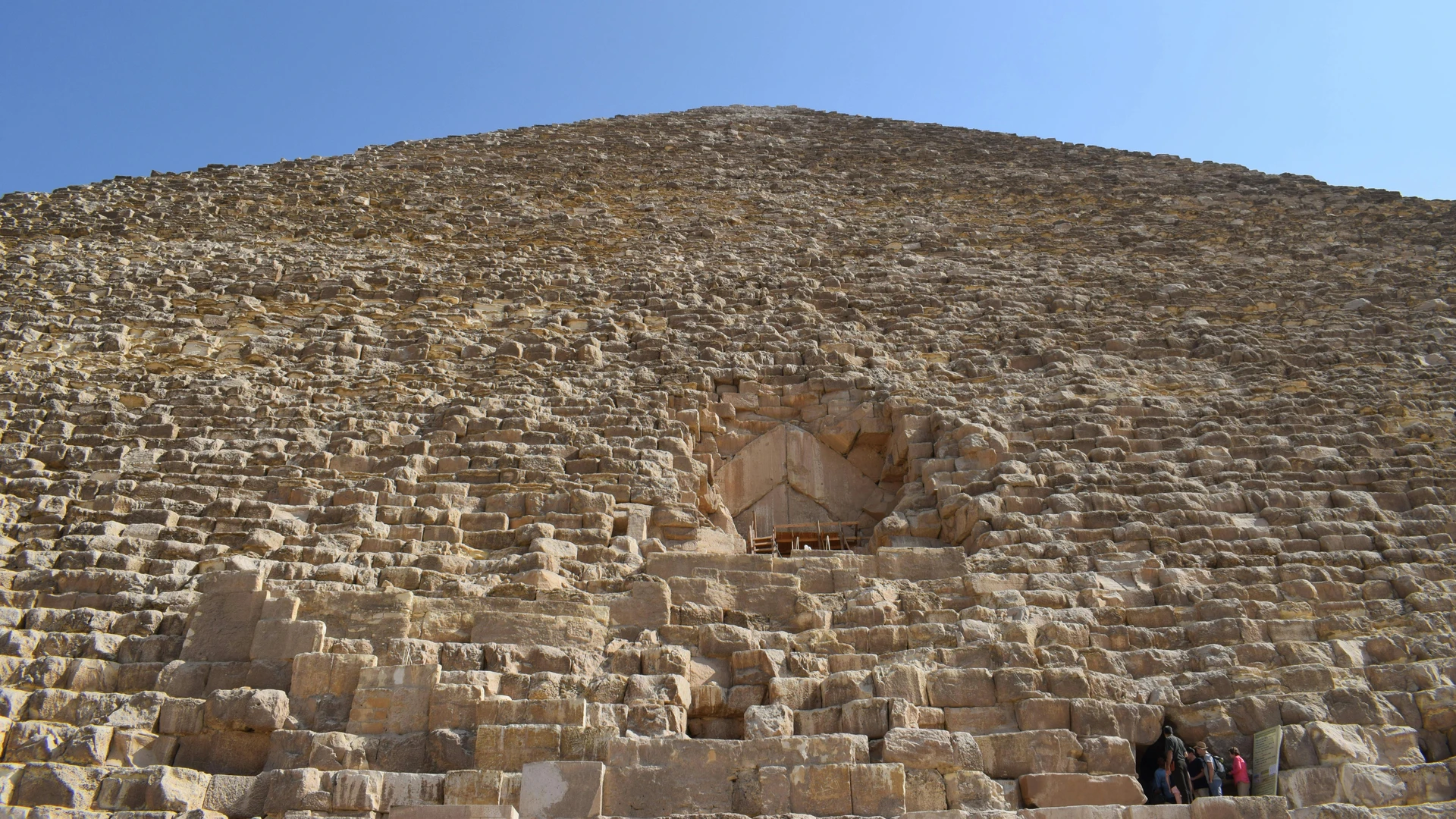 Giza, Egypt - Close-up image of the great pyramid of giza, showcasing its ancient architecture under a clear sky.