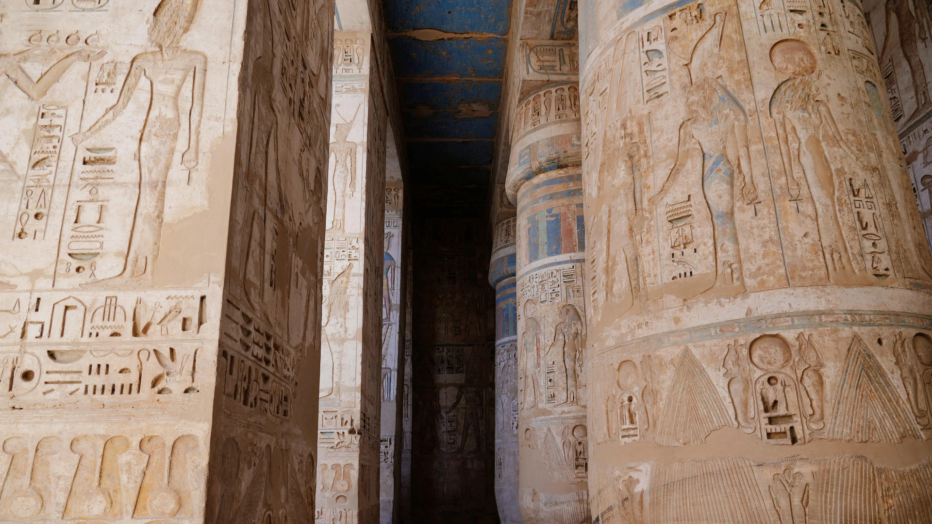 Luxor, Egypt - Detailed view of ancient hieroglyphs on temple columns in luxor, egypt.