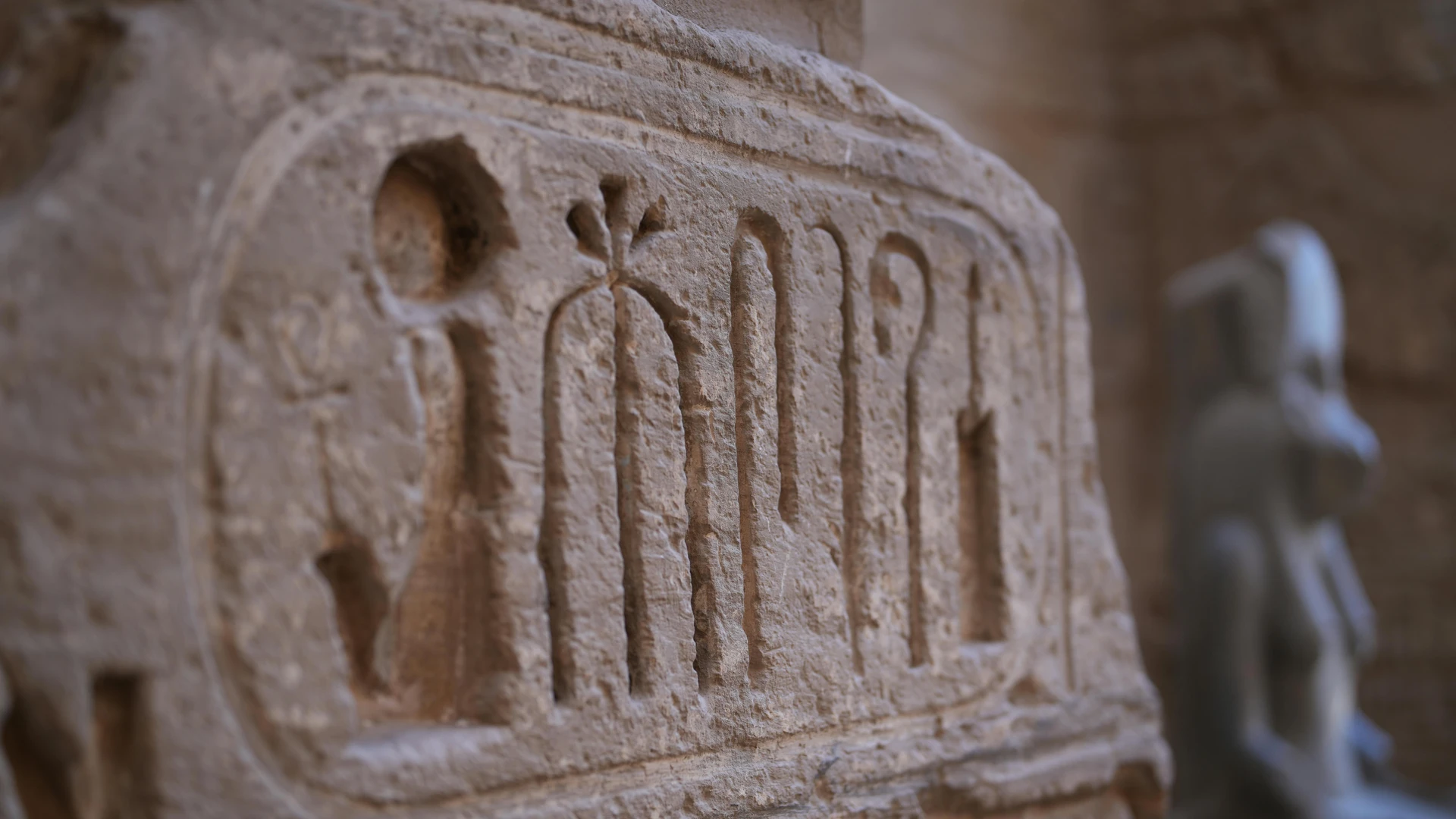 Luxor, Egypt - Close-up of carved hieroglyphs in luxor, egypt's ancient temple showcasing rich egyptian cultural heritage.