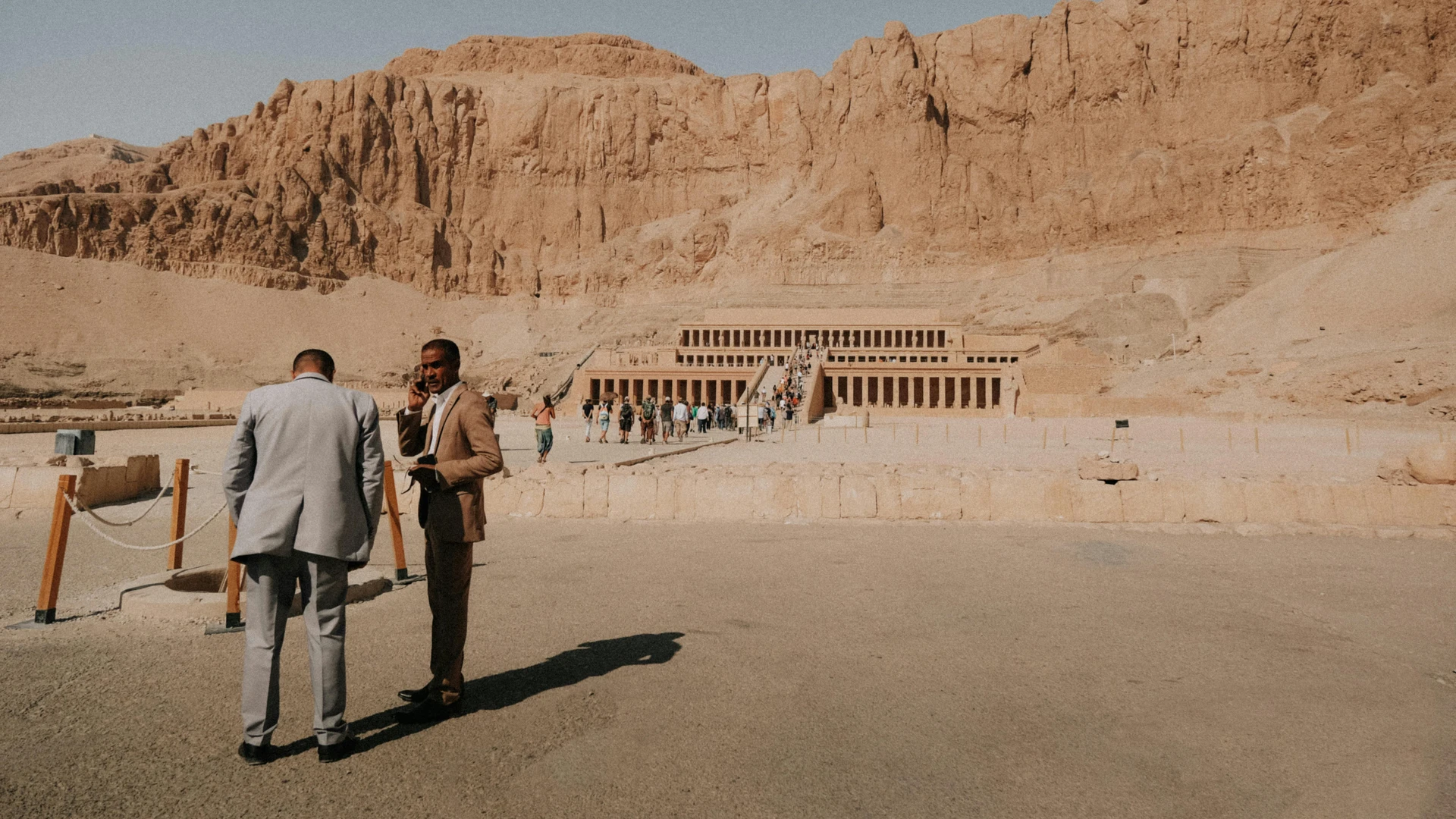 Luxor, Egypt - Tourists visit the mortuary temple of hatshepsut in luxor, egypt, a renowned ancient landmark.